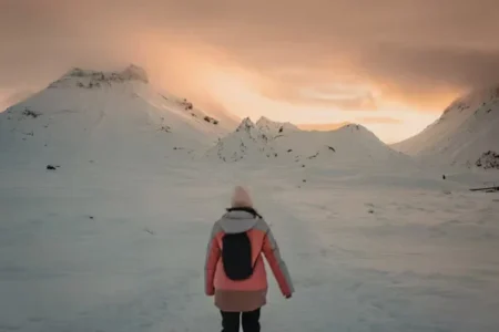 a person walking with snow