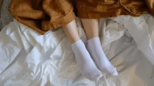 a person wearing white socks