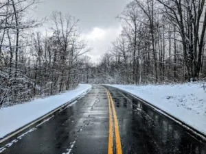 a road alond side snow