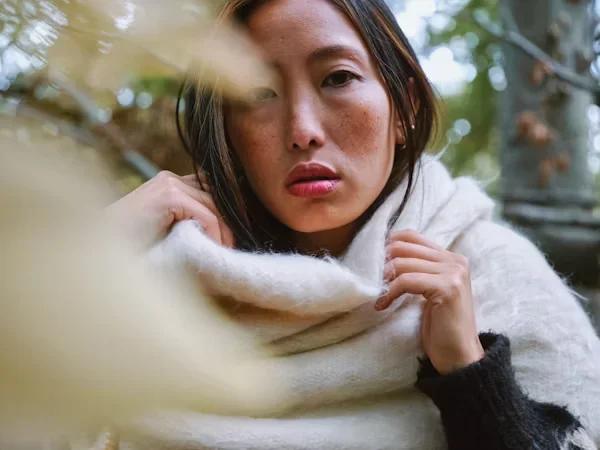 a woman wearing white scarf
