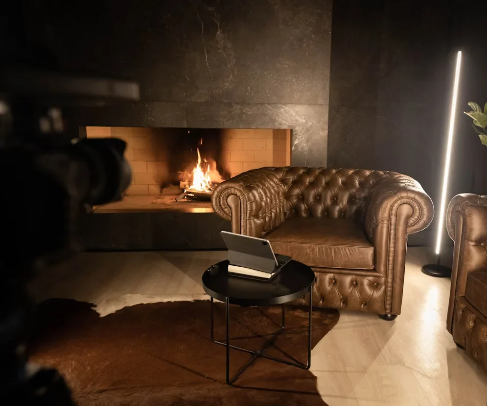 How to Upgrade Your Living Room Without Spending a Fortune on New Furniture sofa near fireplaca