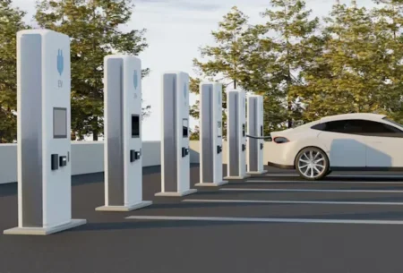 white car parked at EV charging station