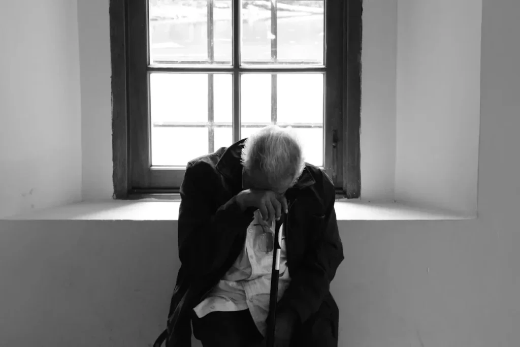 a man is sitting on a chair