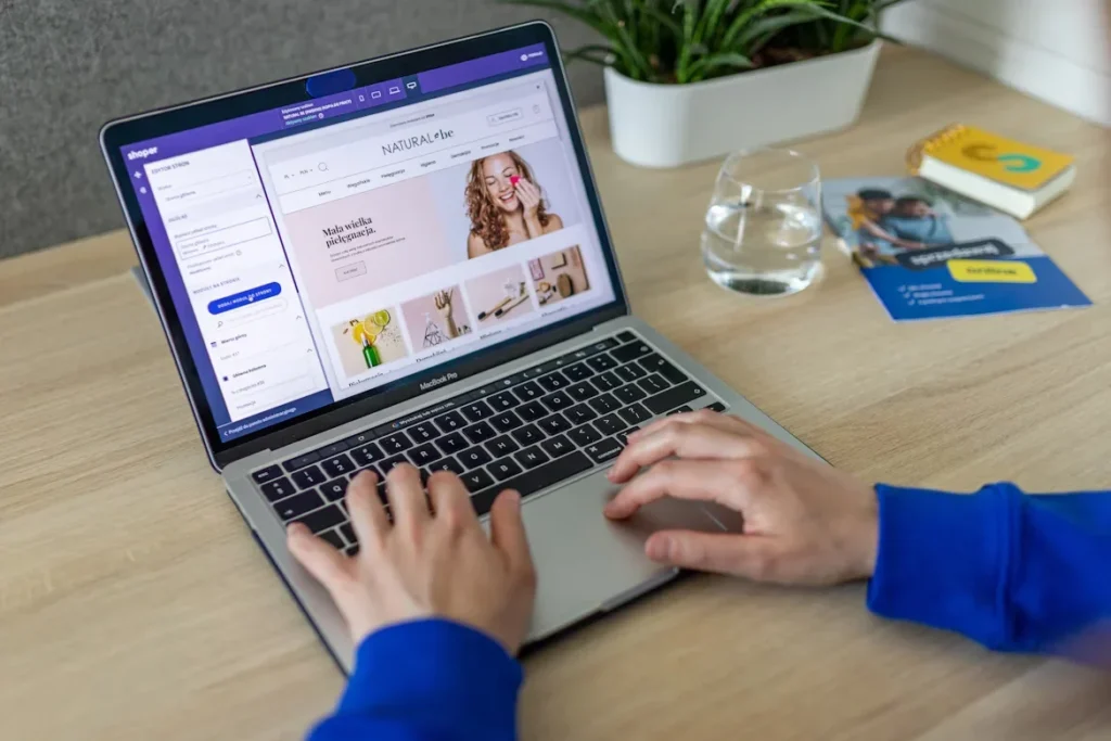 a person typing on a laptop