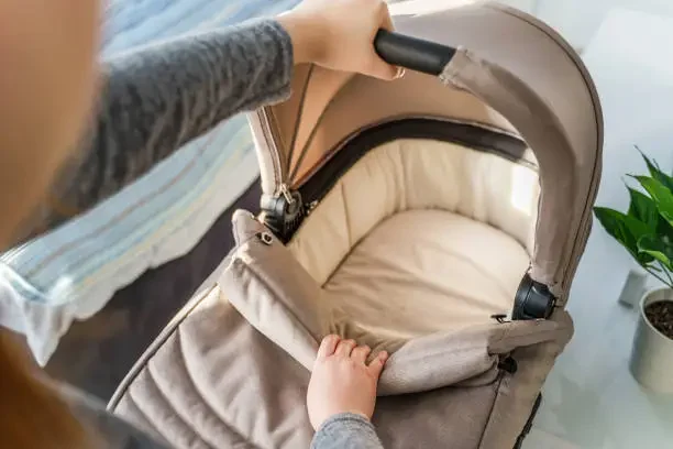 Pram Liner: Comfort and Style for Your Baby’s Ride A woman holding pram