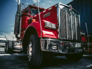 red and white truck on road