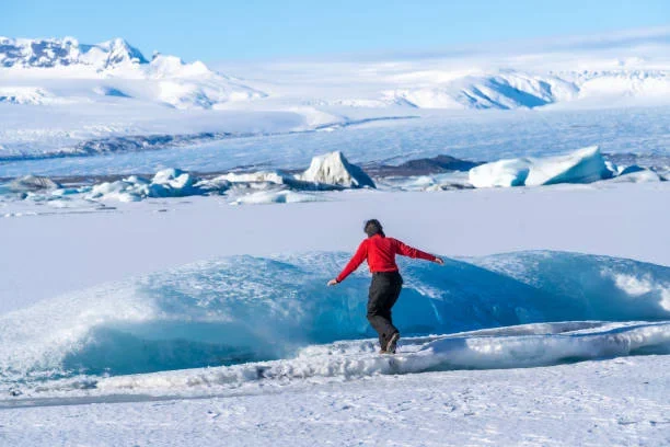 Glacial Surfing in Alaska: Riding Waves on Ice-Crafted Waters surfing