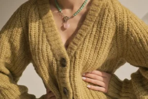 woman wearing yellow knit cardigan