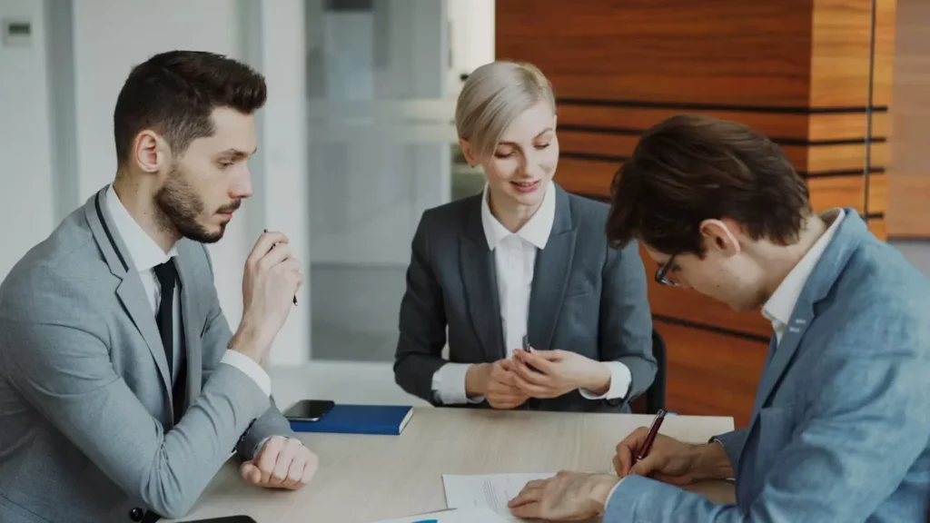 a group of people sitting on table