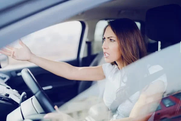 angry lady sitting in car