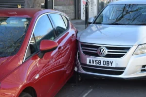 two cars parked next to each other