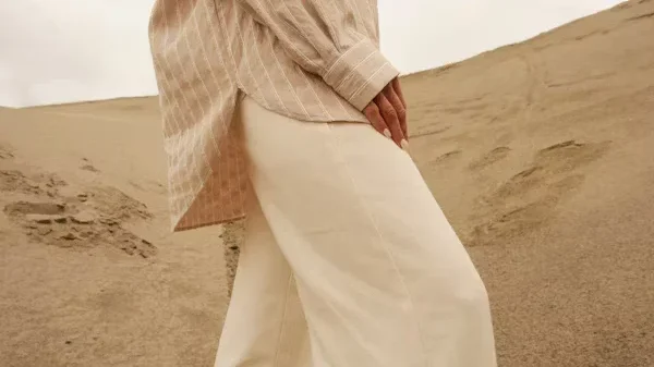 woman standing in sand