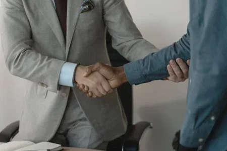 Property manager shaking hands with tenant (1)