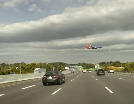 Dashcam Captures Plane Landing on I-95 During Rush Hour; Driver Survives plane landing