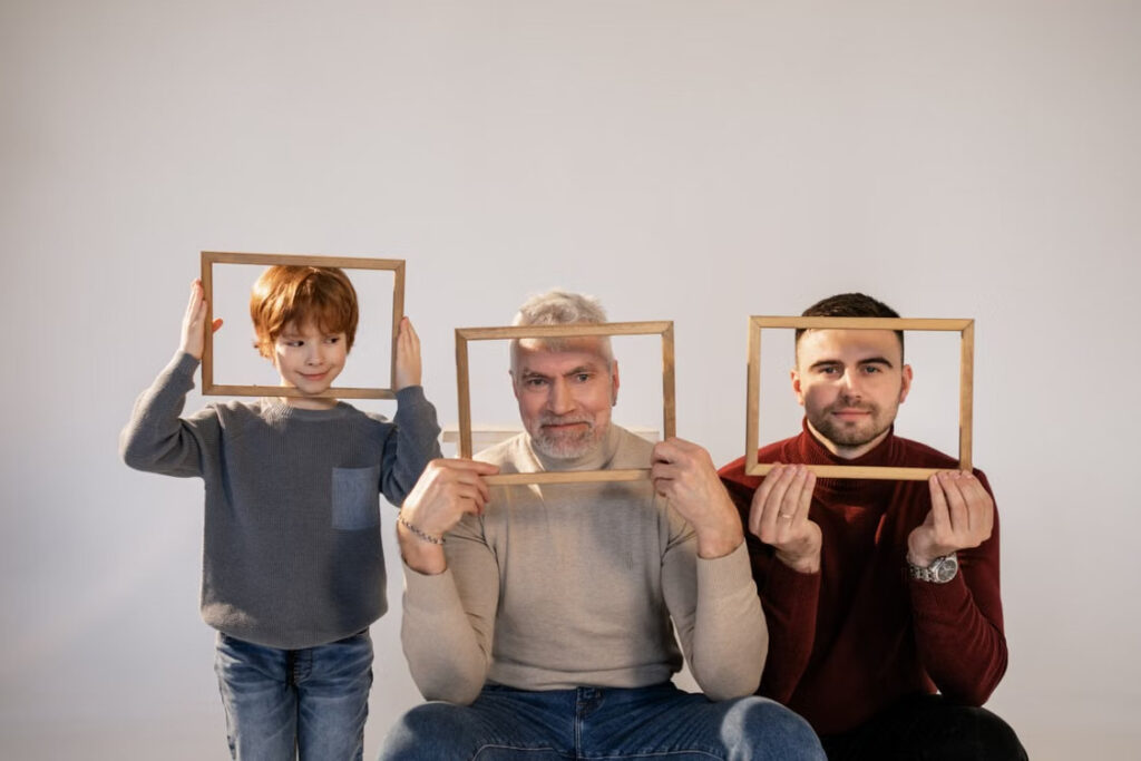 a group of people holding wooden frame